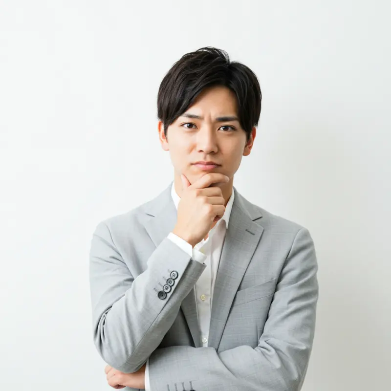 悩んでいる男性